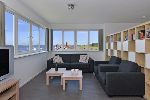 Exclusief penthouse met panoramisch uitzicht en privé aanlegsteiger aan het Veerse Meer - thumbnail 1
