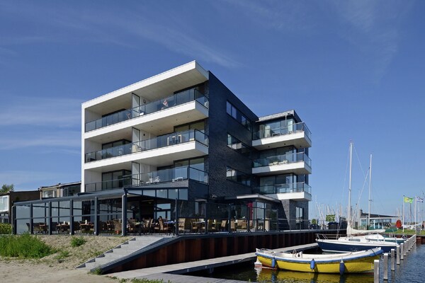 Veerse Muze 7e: luxe appartement met panoramisch uitzicht op het Veerse Meer - thumbnail 5