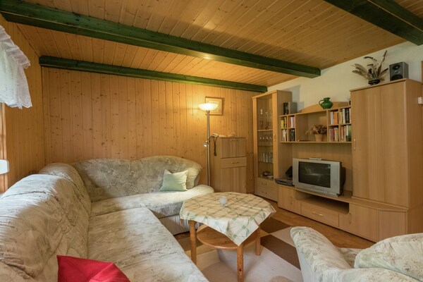Vrijstaande bosbungalow voor 4 personen aan de golfbaan in Neustadt/Harz - thumbnail 2