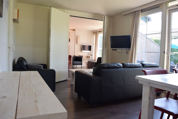 Vrijstaande groepsbungalow voor 10 personen op de Veluwe met tuin - thumbnail 2