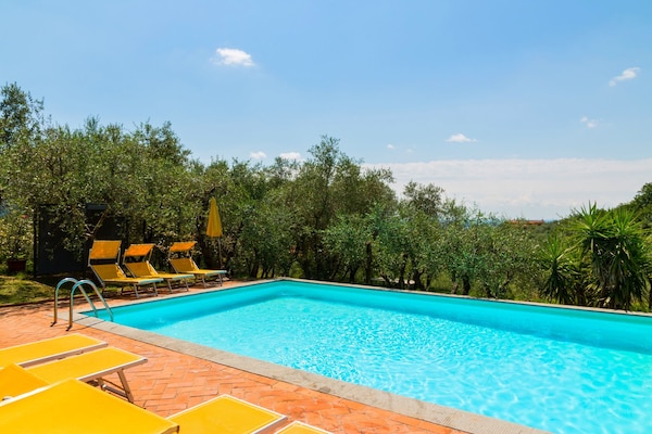 Rustiek appartement Papavero met gedeeld zwembad en wellness in het Toscaanse bos - thumbnail 2