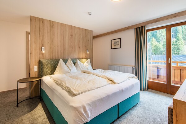 Rustiek appartement in bosrijke omgeving Wald im Pinzgau, vlakbij Zillertal Arena - thumbnail 5