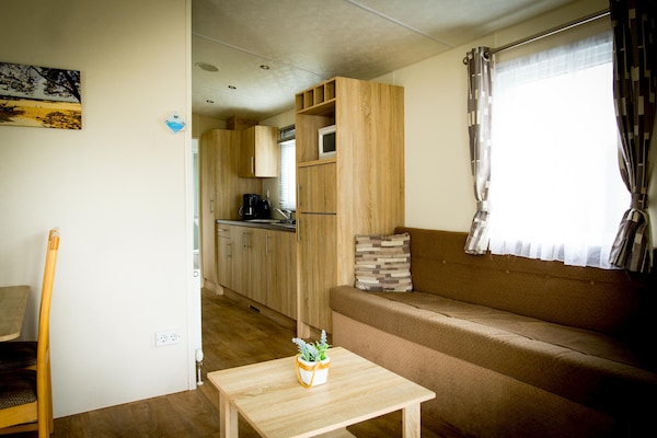 Knusse Delta Lodge op Recreatiepark Duinhoeve in Udenhout - thumbnail 5