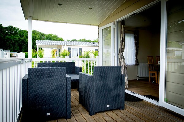 Knusse Delta Lodge op Recreatiepark Duinhoeve in Udenhout - thumbnail 6