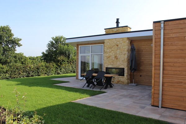 Modern vakantiehuis met haard en terras, 10 min van Maastricht - thumbnail 1