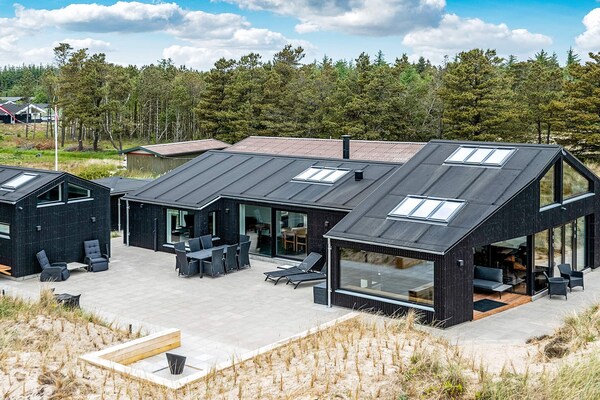 Architectonisch vakantiehuis met zeezicht en sauna op 50m van het strand - thumbnail 2