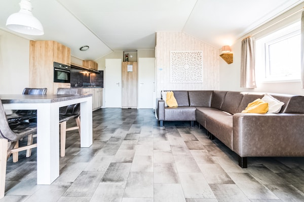 Knus waterchalet met privéveranda en aanlegsteiger in Bant, Flevoland - thumbnail 2