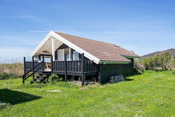 Knus houten vakantiehuis op 100 meter van zee met panoramisch uitzicht - thumbnail 1