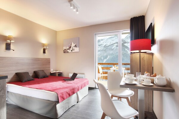 Knus chalet-appartement op vakantiepark Pra Loup 1500, hond welkom - thumbnail 6