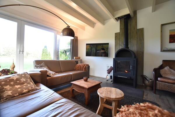 Luxe vrijstaande wellnessbungalow met serre aan de rand van Twente - thumbnail 6