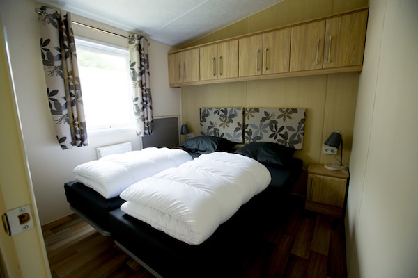 Gezellig chalet in duinparadijs Udenhout met zwembad en speeltuin - thumbnail 3