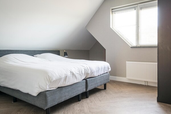 Luxe vrijstaande villa aan het Krimbos op Texel | 8 personen - thumbnail 3