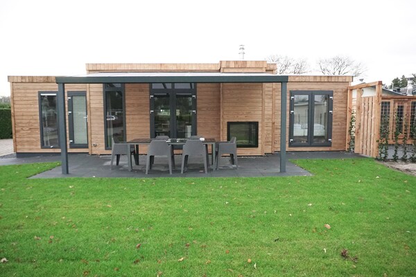 Wellness chalet met privésauna op de Veluwe, huisdiervriendelijk - thumbnail 1