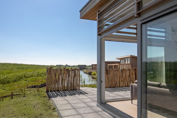 Duurzame waterlodge met tuin, honden welkom in Kamperland, Zeeland - thumbnail 6