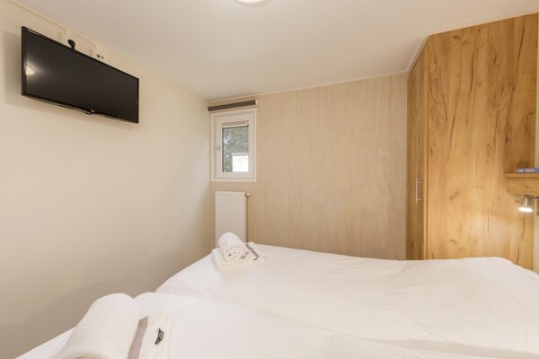 Modern chalet met wellnessoptie op hondvriendelijk Vakantiepark Kijkduin - thumbnail 6