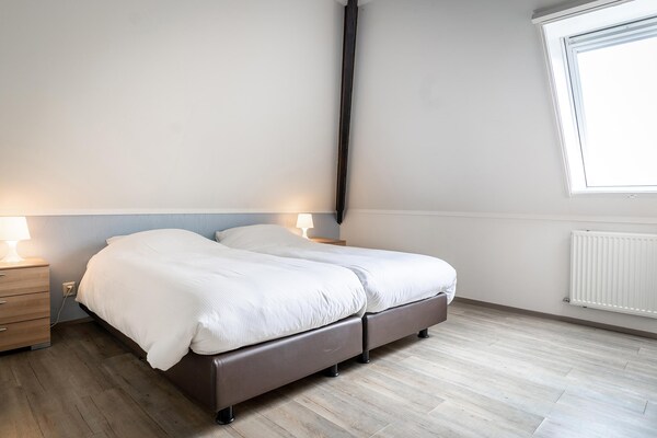 Knus hoekappartement in historische stolpboerderij op Texel, nabij bos en golfbaan - thumbnail 3