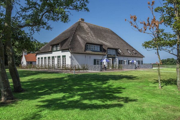 Appartement in sfeervolle stolpboerderij Hoeve Holland, Texel - thumbnail 1