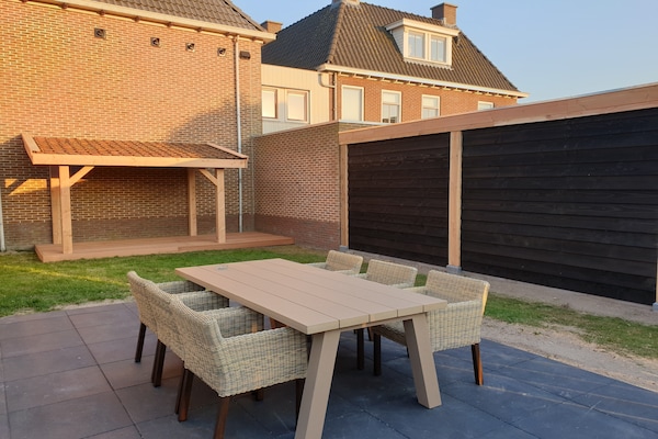 Vrijstaande bosbungalow bij golfbaan, 50m van centrum De Cocksdorp - thumbnail 3