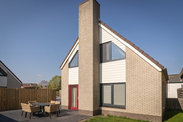 Vrijstaande bosbungalow bij golfbaan, 50m van centrum De Cocksdorp - thumbnail 1