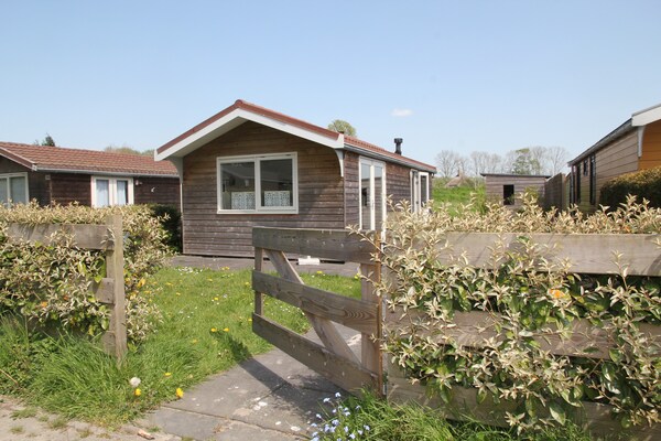 Landelijke bungalow bij zee met hondvriendelijk bos in Warmenhuizen - thumbnail 6