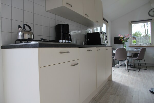 Landelijke bungalow bij zee met hondvriendelijk bos in Warmenhuizen - thumbnail 4