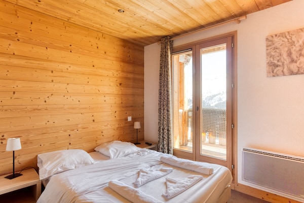 Ruim chalet voor 8 personen in Les Portes du Grand Massif, direct aan de piste - thumbnail 2
