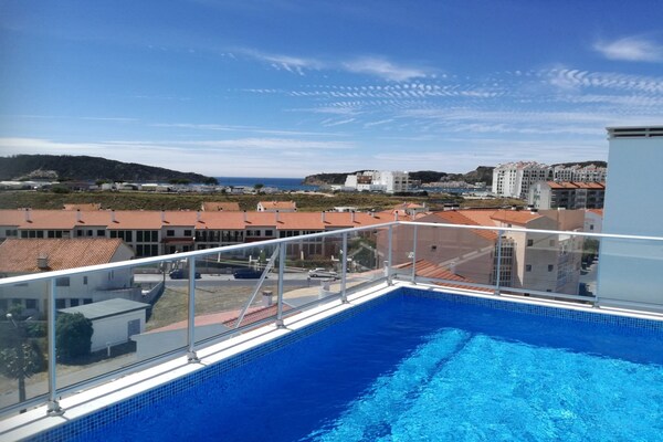 Licht appartement met dakterras en zwembad op 700 meter van de baai - thumbnail 2