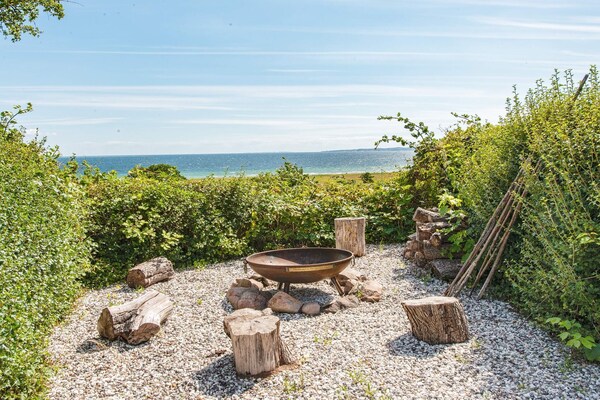 Rietgedekt vakantiehuis met panoramisch uitzicht over de Ebeltoft Vig op 100m van zee - thumbnail 4