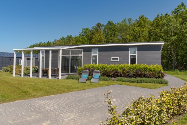 Modern vakantiehuis aan bosrand in Wemeldinge met wellnessfaciliteiten - thumbnail 6