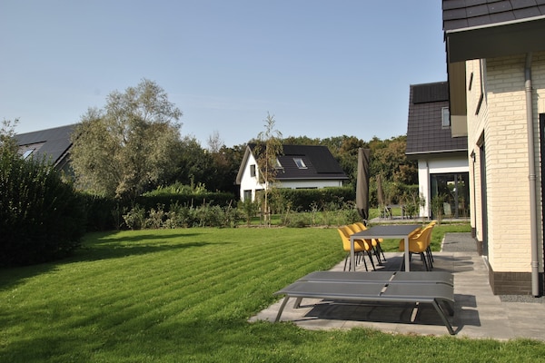 Luxe vakantiehuis met sauna in bosrijke omgeving bij De Koog - thumbnail 2