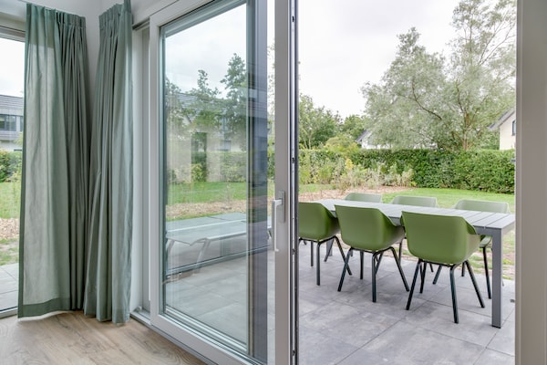 Luxe vakantiewoning met sauna en sunshower in bosrijk De Koog - thumbnail 2
