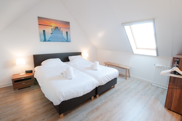 Design wellnessvilla voor 6 personen op Vakantiepark Oesterdam, Tholen - thumbnail 4