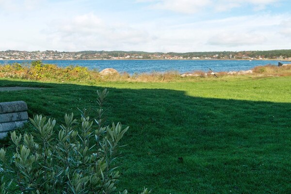 Exclusief vakantiehuis direct aan zee met panoramisch uitzicht over de baai van Ebeltoft - thumbnail 3