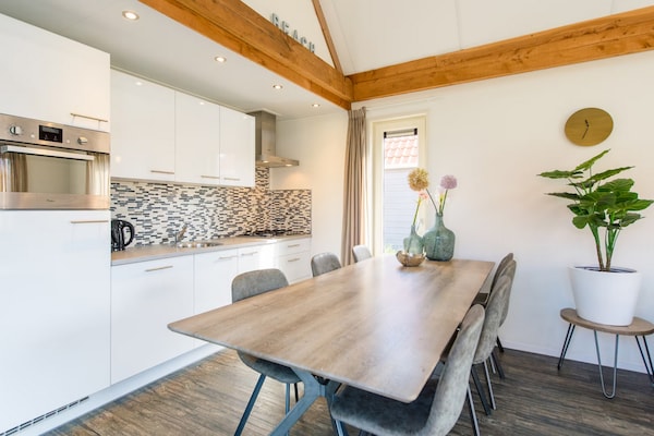Moderne gezinsbungalow bij zee op Ameland – Vakantiepark Boomhiemke - thumbnail 3