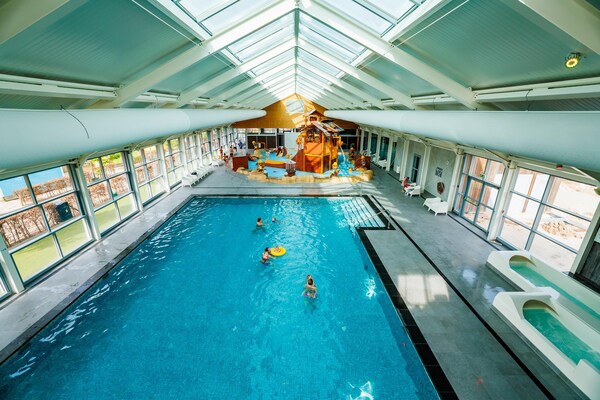 Moderne designvilla voor 8 personen aan het water in Maurik - thumbnail 2