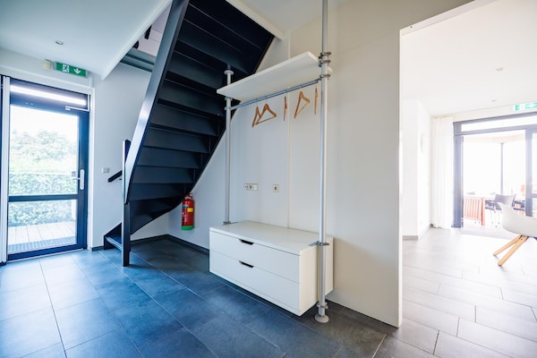 Moderne designvilla voor 8 personen aan het water in Maurik - thumbnail 6