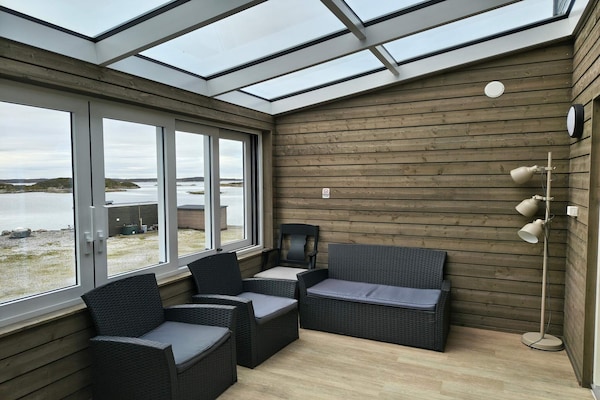 Authentieke rorbu direct aan zee met privéstrand en panoramisch uitzicht - thumbnail 3