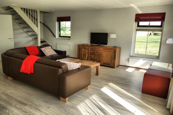 Wellnessbungalow aan Emslandermeer voor 12 personen met sauna en tuin - thumbnail 1
