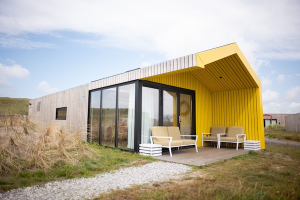 Moderne lodge op 500m van strand, hondvriendelijk vakantiepark - thumbnail 1