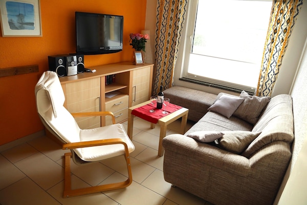 4-persoons appartement aan zee in Poel met tuin en open haard - thumbnail 4