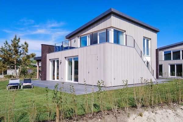 Luxe villa aan het Veerse Meer met panoramisch dakterras en golfomgeving - thumbnail 5