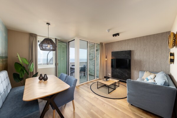 Stijlvol appartement aan zee met balkon in Egmond aan Zee - thumbnail 1