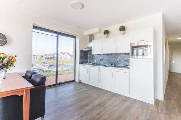 Luxe appartement aan Veerse Meer met panoramisch terras en golfbaan - thumbnail 2