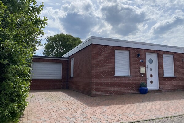 Gelijkvloerse bungalow met sauna en tuin vlak achter de dijk in Dornumersiel - thumbnail 6