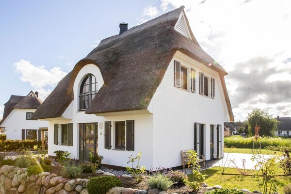 Luxe rietgedekt vakantiehuis met sauna en eigen zwemplek aan de lagune - thumbnail 3