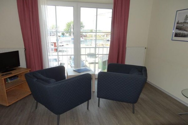 Studio met uitzicht op jachthaven en vuurtoren in Orth, Fehmarn - thumbnail 3
