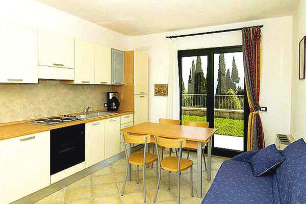Appartement met zwembad en spectaculair uitzicht op het Gardameer in Pieve - thumbnail 3