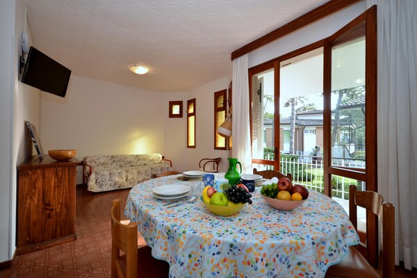 Appartement voor 6 aan de golfbaan in Lignano Pineta met strandservice - thumbnail 3