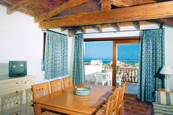 Authentiek appartement op heuveltop met panoramisch zeezicht bij Stintino - thumbnail 3