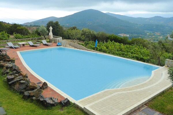 Vrijstaande villa met gedeeld zwembad en uitzicht op Rio nell'Elba - thumbnail 2